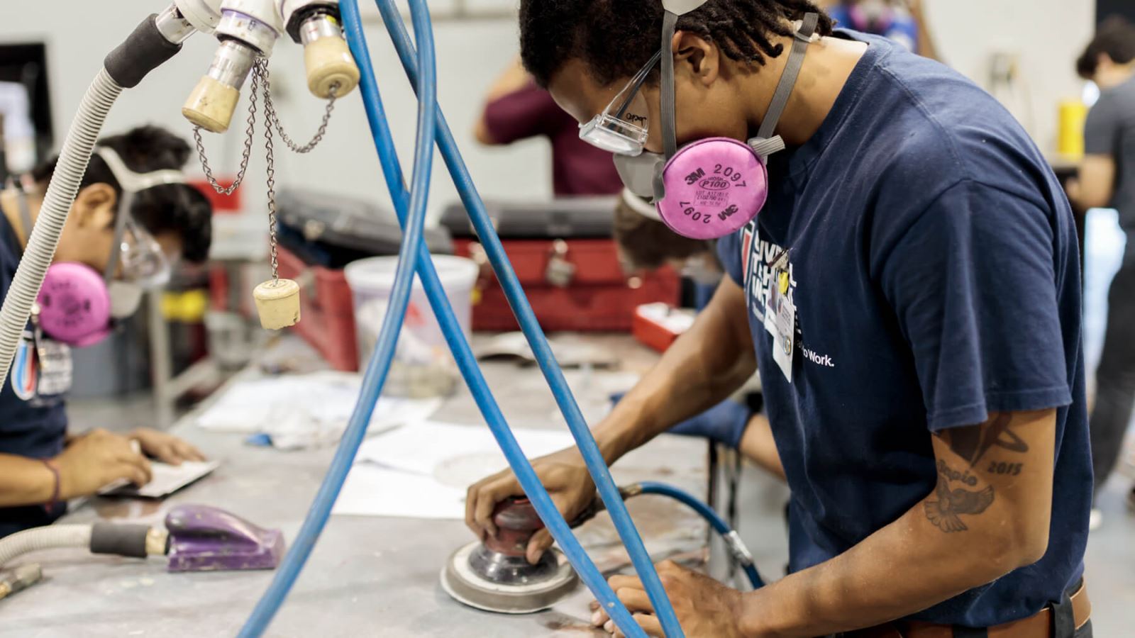 Student working with machinery